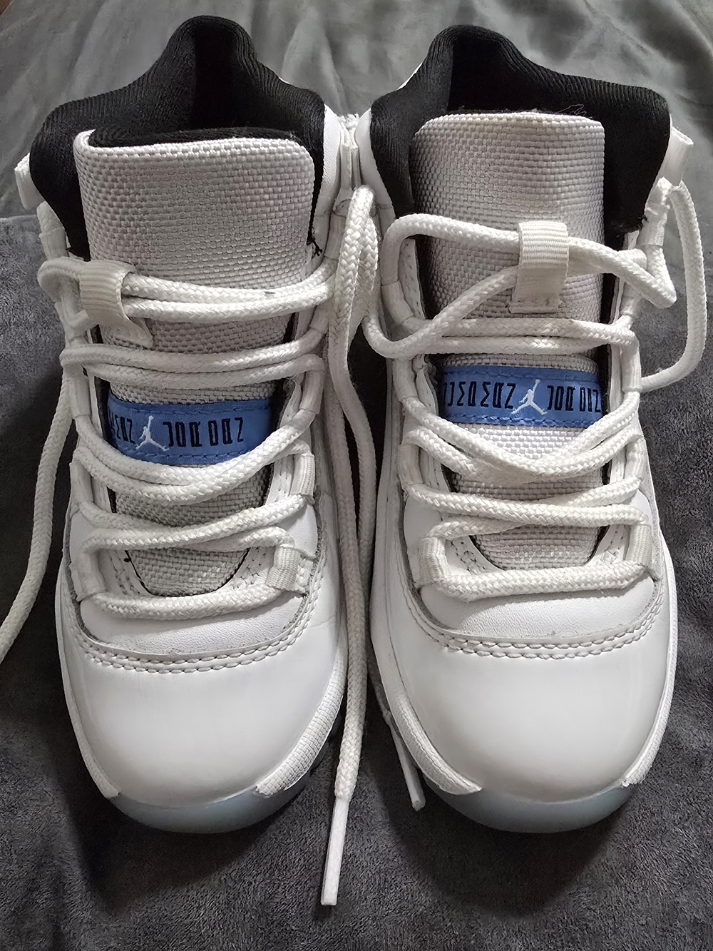 Jordan Kids' White and Black Basketball Shoes with Blue Accent